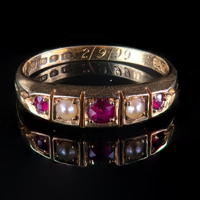 Lot 612 - A LATE 19TH CENTURY RUBY AND SPLIT PEARL FIVE STONE RING