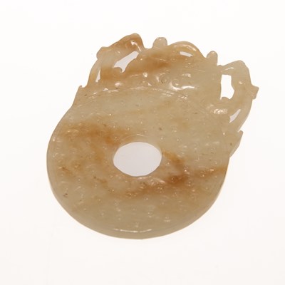 Lot 205 - A CHINESE JADE BI DISC