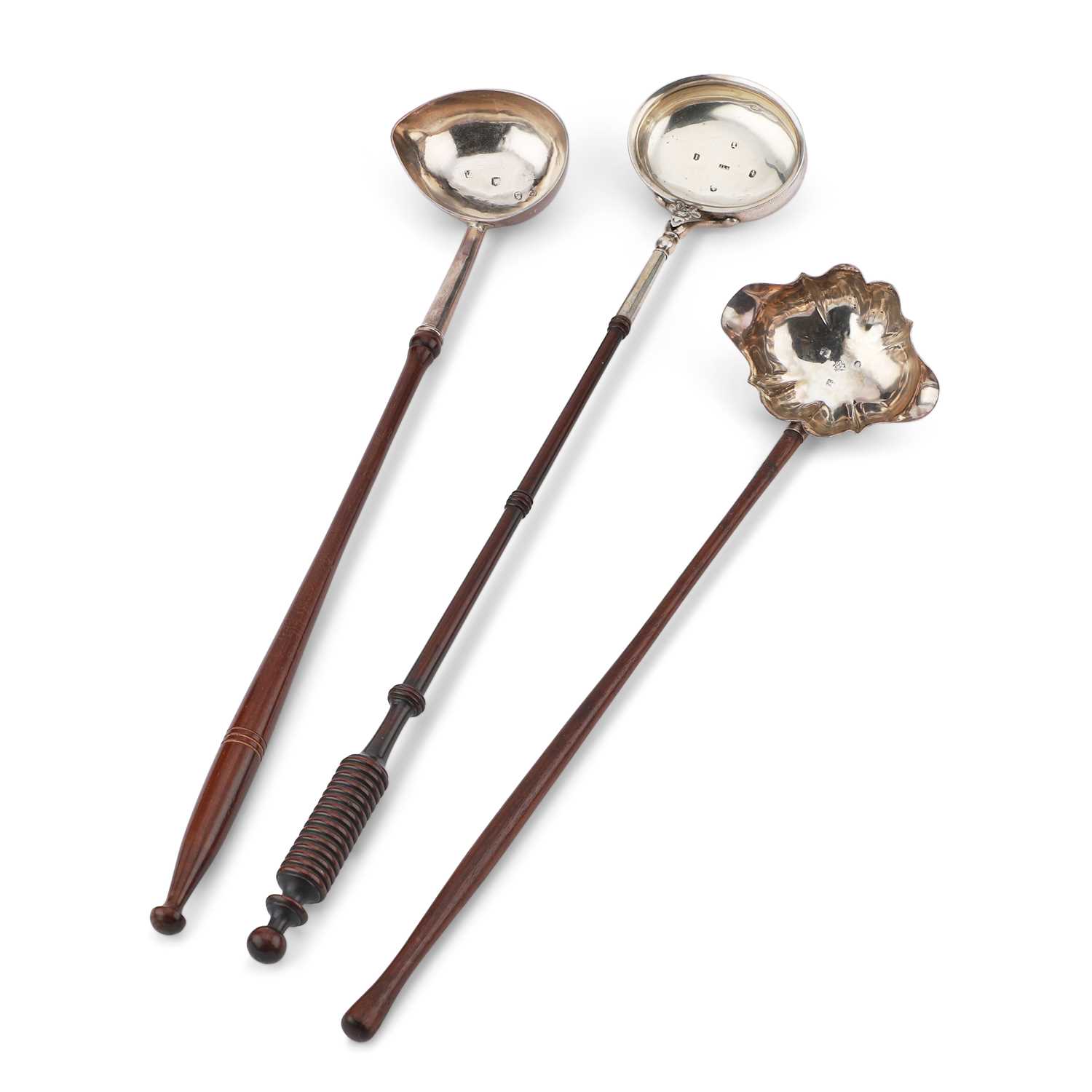 Lot 240 - THREE SILVER TODDY LADLES