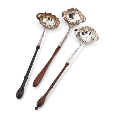 Lot 178 - THREE GEORGE II SILVER TODDY LADLES