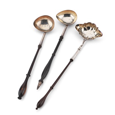 Lot 182 - THREE GEORGE II SILVER TODDY LADLES