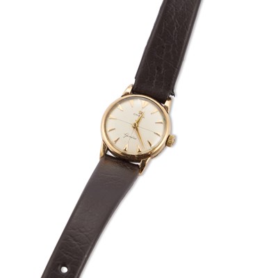 Lot 605 - A LADY'S 9CT GOLD OMEGA STRAP WATCH