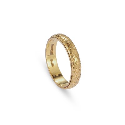 Lot 648 - A 22 CARAT GOLD BAND RING