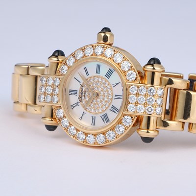 Lot AN 18CT GOLD DIAMOND-SET LADY'S CHOPARD IMPERIALE BRACELET WATCH