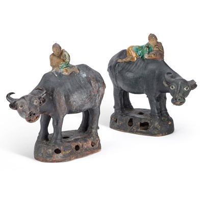 Lot 82 - A PAIR OF CHINESE POTTERY FIGURES OF BUFFALO