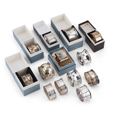 Lot 403 - A COLLECTION OF THIRTEEN SILVER NAPKIN RINGS