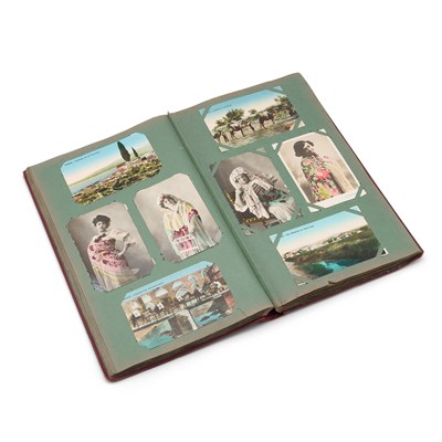 Lot 278 - AN ALBUM OF VINTAGE POSTCARDS