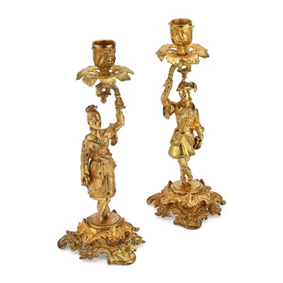 Lot 215 - A PAIR OF 19TH CENTURY GILT-BRASS CHINOISERIE CANDLESTICKS
