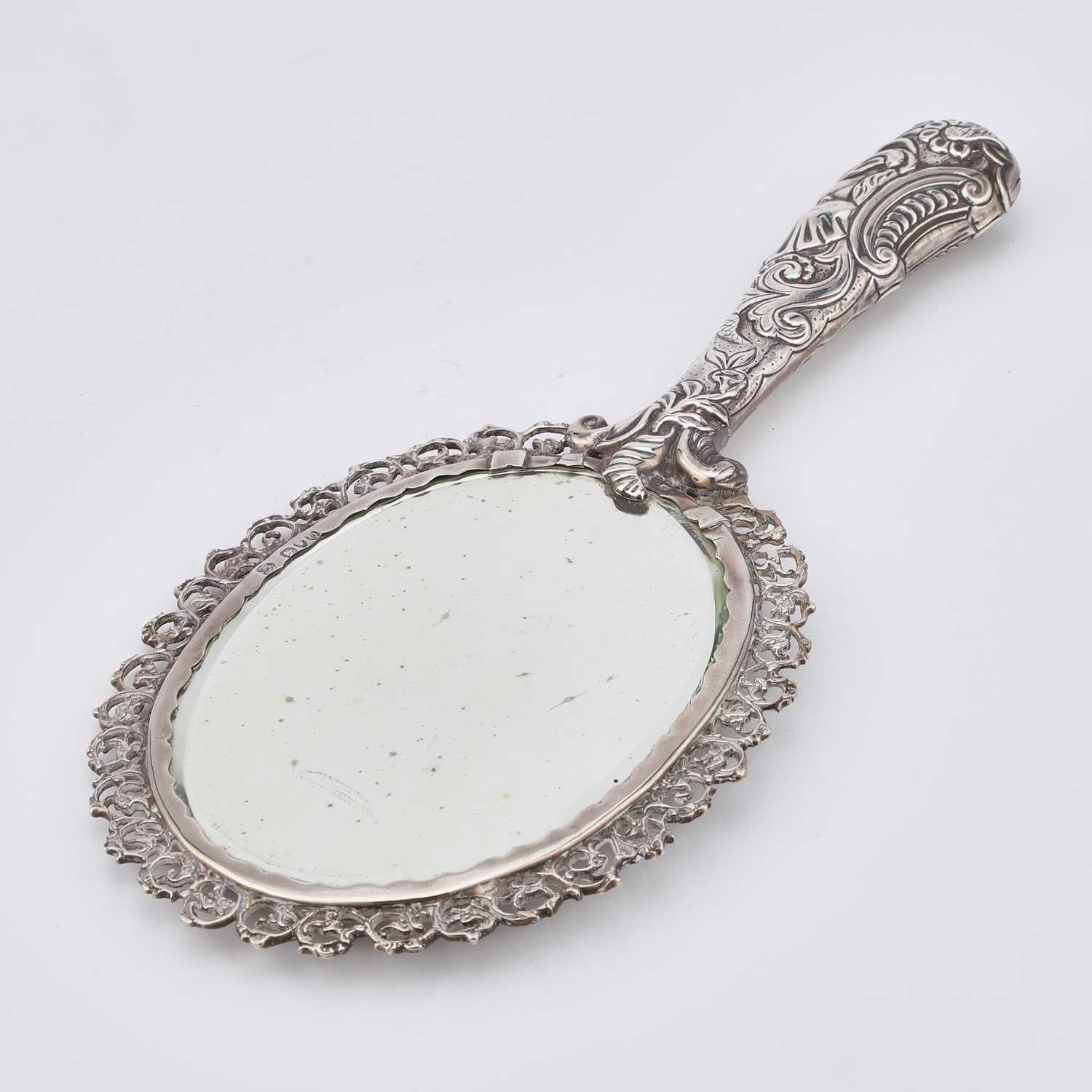 Lot 519 A VICTORIAN SILVER HANDMIRROR