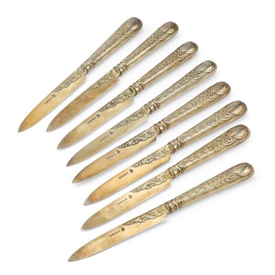 Lot 490 - A FINE SET OF EIGHT VICTORIAN SILVER-GILT KNIVES