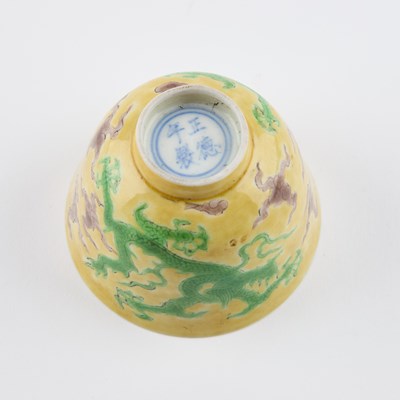 Lot 142 - A CHINESE YELLOW-GROUND 'DRAGON' CUP