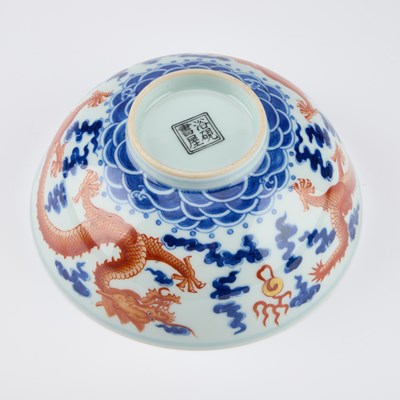 Lot 154 - A CHINESE IRON-RED AND UNDERGLAZE BLUE 'DRAGON' BOWL
