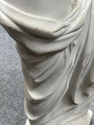 Lot 671 - AFTER THE ANTIQUE, A LARGE CARVED MARBLE FIGURE OF THE VENUS DE MILO, 19TH CENTURY