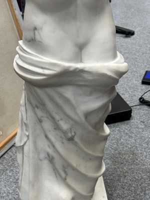 Lot 671 - AFTER THE ANTIQUE, A LARGE CARVED MARBLE FIGURE OF THE VENUS DE MILO, 19TH CENTURY