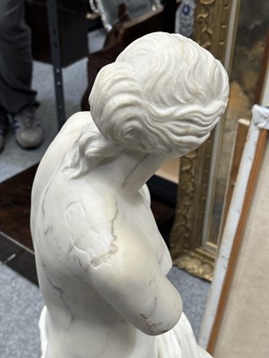 Lot 671 - AFTER THE ANTIQUE, A LARGE CARVED MARBLE FIGURE OF THE VENUS DE MILO, 19TH CENTURY