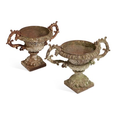 Lot 661 - A PAIR OF 19TH CENTURY CAST IRON URNS