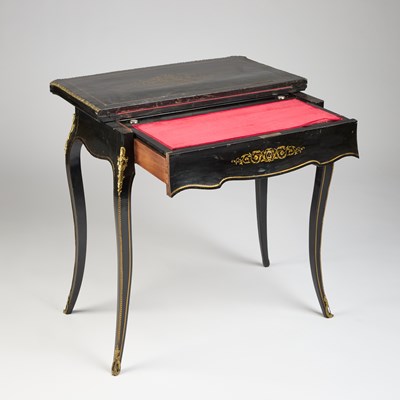 Lot 734 - A NAPOLEON III BRASS-INLAID EBONISED LADIES DRESSING TABLE-CUM-GAMES TABLE