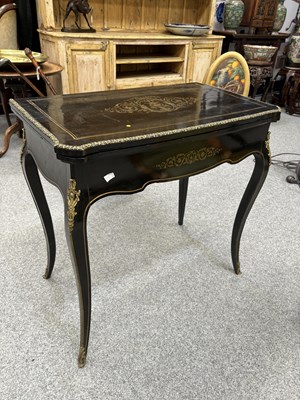 Lot 734 - A NAPOLEON III BRASS-INLAID EBONISED LADIES DRESSING TABLE-CUM-GAMES TABLE