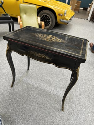 Lot 734 - A NAPOLEON III BRASS-INLAID EBONISED LADIES DRESSING TABLE-CUM-GAMES TABLE