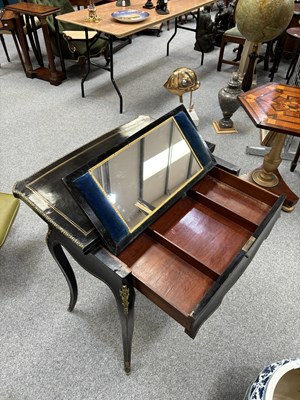 Lot 734 - A NAPOLEON III BRASS-INLAID EBONISED LADIES DRESSING TABLE-CUM-GAMES TABLE