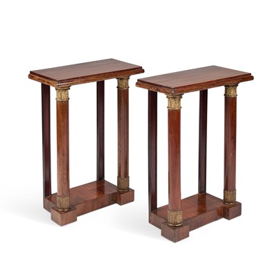 Lot 691 - A PAIR OF CONTINENTAL PARCEL-GILT ROSEWOOD PIER TABLES