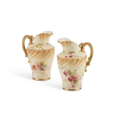 Lot 75 - A PAIR OF ROYAL WORCESTER BLUSH IVORY JUGS, DATED 1893
