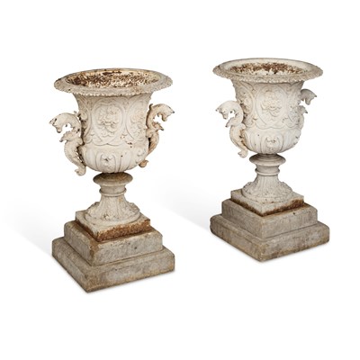 Lot 660 - A PAIR OF CAST IRON URNS