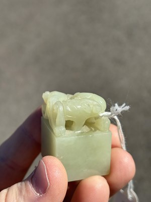 Lot 125 - A CHINESE CELADON JADE 'CHILONG' SEAL