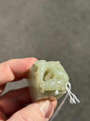 Lot 125 - A CHINESE CELADON JADE 'CHILONG' SEAL