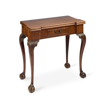 Lot 679 - A LATE 19TH CENTURY MAHOGANY FOLDOVER GAMES TABLE IN GEORGE II IRISH STYLE