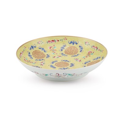 Lot 106 - A CHINESE FAMILLE ROSE YELLOW-GROUND DISH