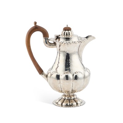 Lot 314 - AN ARTS AND CRAFTS SILVER COFFEE JUG