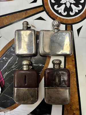 Lot 167 - TWO SILVER HIP FLASKS AND SIX SILVER-PLATED HIP FLASKS
