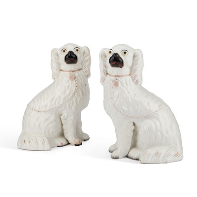 Lot 65 - A PAIR OF VICTORIAN STAFFORDSHIRE POTTERY MODELS OF SEATED SPANIELS