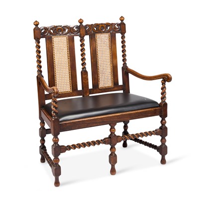 Lot 1081 - A JACOBEAN STYLE OAK CHAIR-BACK SETTEE, CIRCA 1920