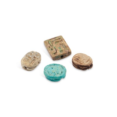 Lot 12 - THREE ANCIENT EGYPTIAN SCARAB AMULETS, LATE PERIOD (664-332 B.C.)