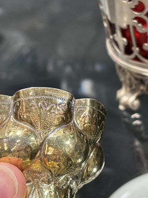 Lot 270 - AN EARLY 17TH CENTURY GERMAN PARCEL-GILT SILVER CUP