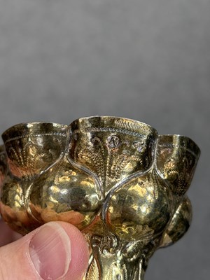 Lot 270 - AN EARLY 17TH CENTURY GERMAN PARCEL-GILT SILVER CUP