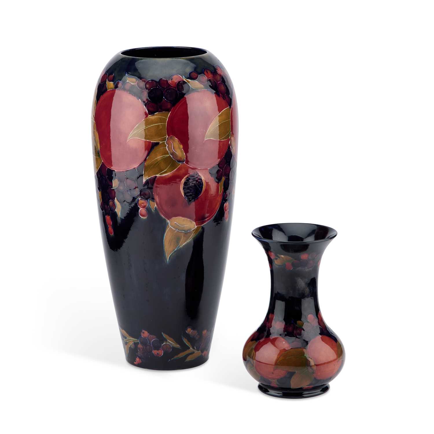 Lot 138 - TWO WILLIAM MOORCROFT 'POMEGRANATE' PATTERN VASES