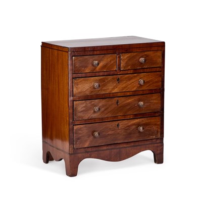 Lot 1073 - A GEORGE III MAHOGANY MINIATURE CHEST OF DRAWERS