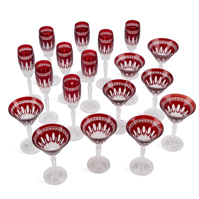 Lot 60 - A SUITE OF RUBY AND CLEAR GLASS FLUTES AND WINE GLASSES