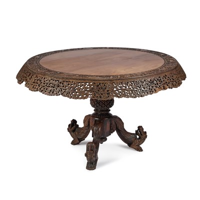 Lot 1157 - A BURMESE CARVED HARDWOOD TILT-TOP CENTRE TABLE