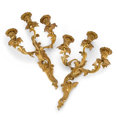 Lot 933 - A PAIR OF ROCOCO REVIVAL ORMOLU THREE-LIGHT WALL SCONCES