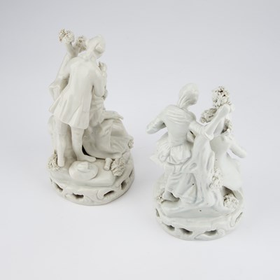 Lot 91 - A PAIR OF STAFFORDSHIRE WHITE-GLAZED FIGURE GROUPS OF A HAIRDRESSER AND A SHOEBLACK, CIRCA 1830
