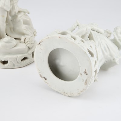 Lot 91 - A PAIR OF STAFFORDSHIRE WHITE-GLAZED FIGURE GROUPS OF A HAIRDRESSER AND A SHOEBLACK, CIRCA 1830