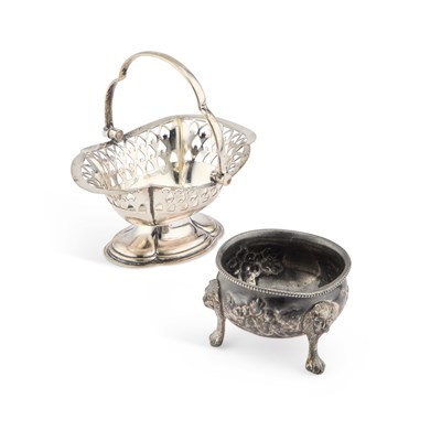 Lot 29 - A SILVER-PLATED SALT TOGETHER WITH A SWING HANDLED BASKET