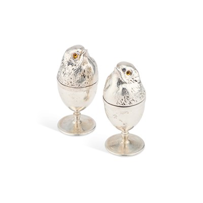 Lot 232 - A PAIR OF SILVER-PLATED NOVELTY EGG CUPS