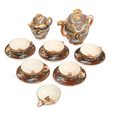 Lot 242 - AN EARLY 20TH CENTURY JAPANESE SATSUMA PARTIAL TEA SERVICE