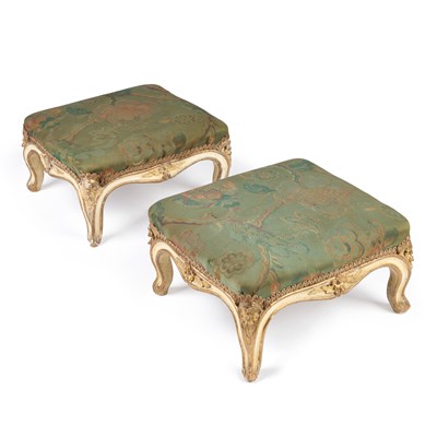 Lot 734 - A PAIR OF PAINTED AND UPHOLSTERED FOOTSTOOLS