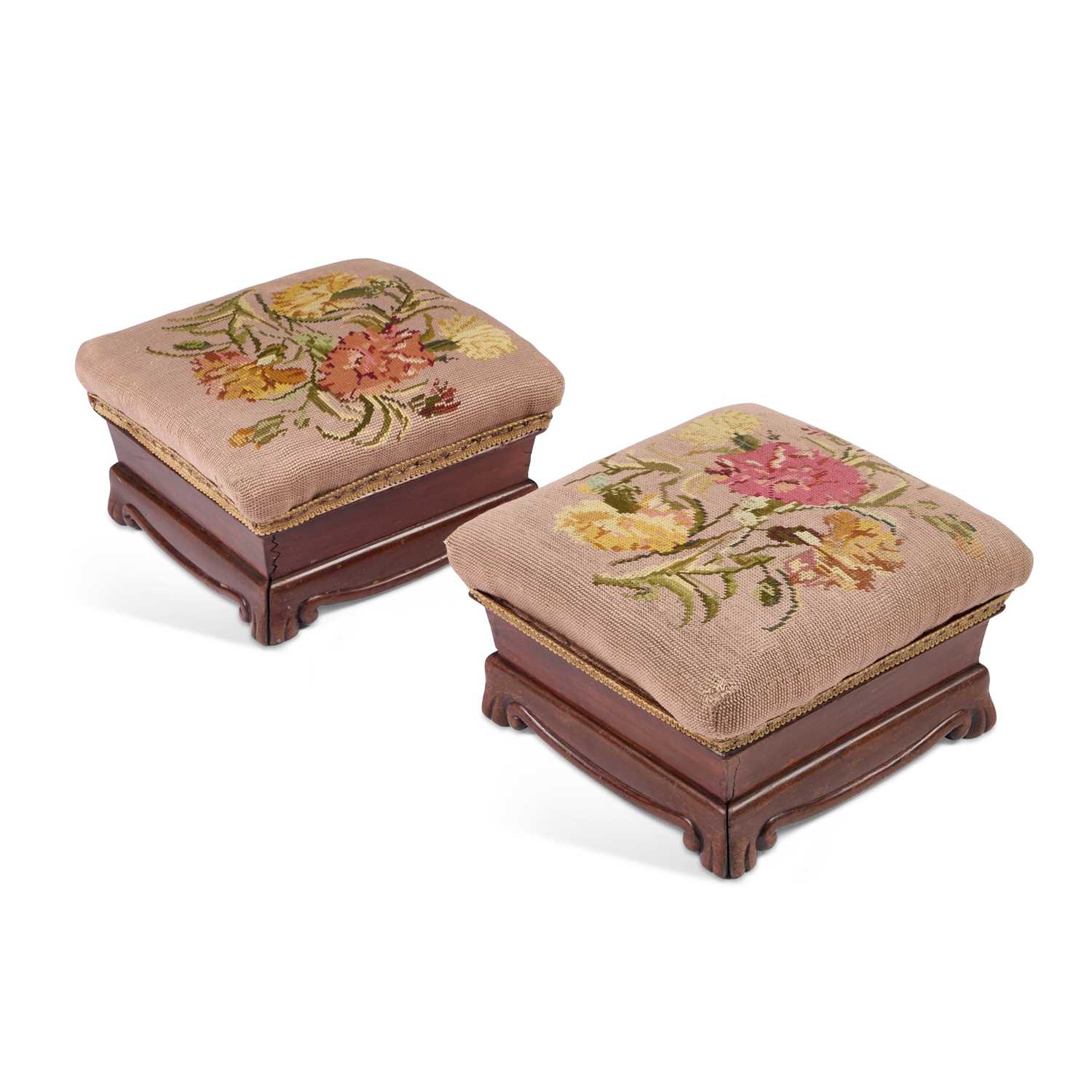 Lot 284 - A PAIR OF VICTORIAN MAHOGANY AND NEEDLEWORK UPHOLSTERED FOOTSTOOLS